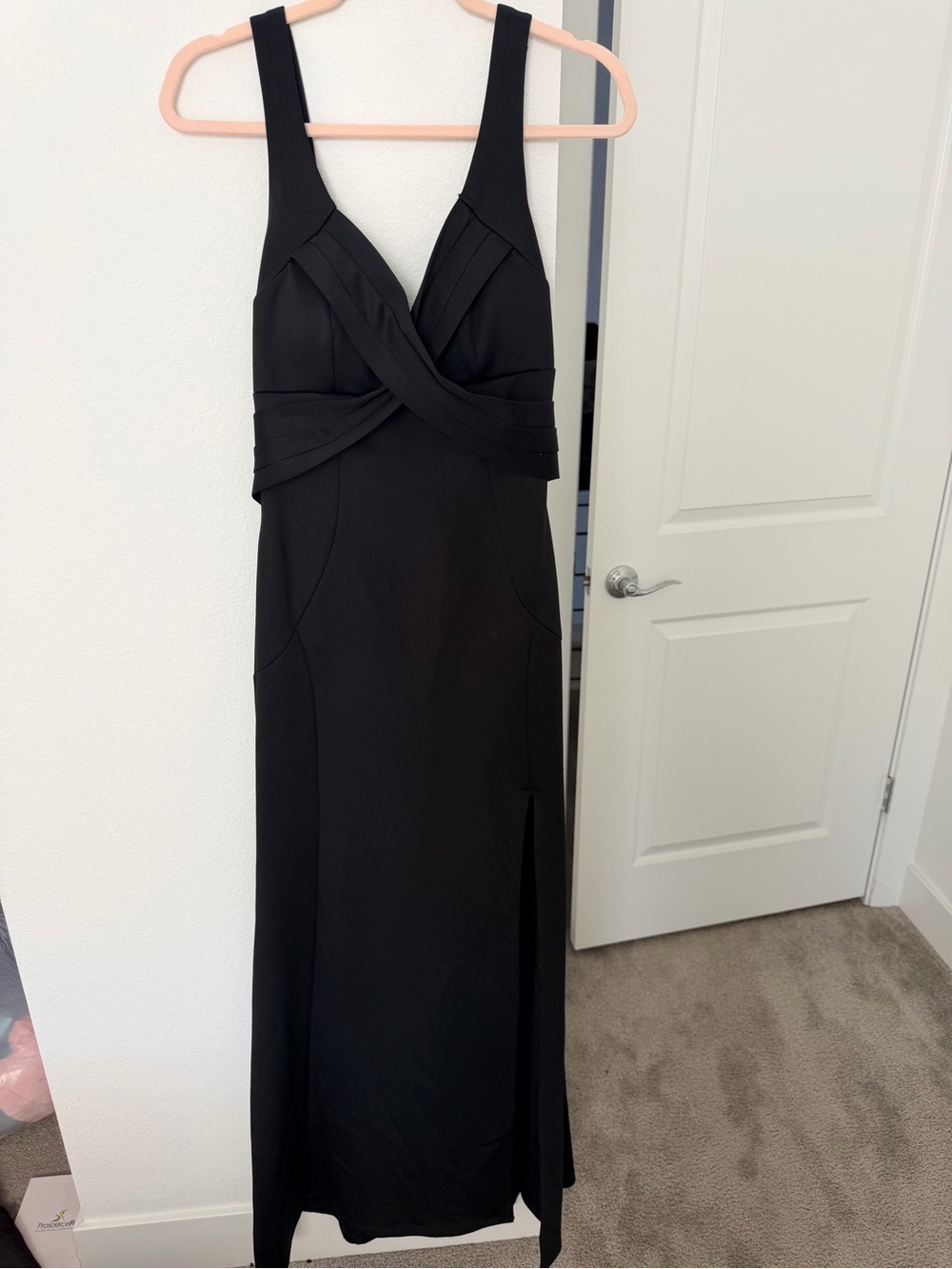 Windsor Black long sleek dress with Twist Front and leg side slit.